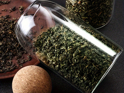 Set van 3 glazen opbergpotten met kurkdeksels.