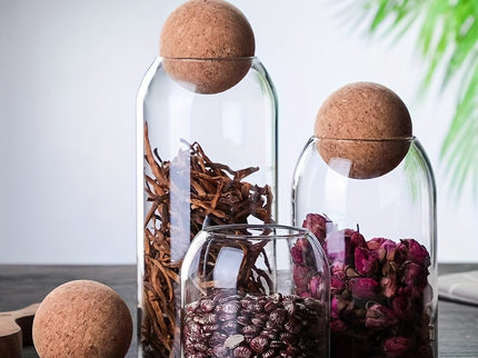 Set van 3 glazen opbergpotten met kurkdeksels.